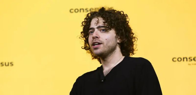 Shayne Coplan氏とPolymarketのロゴ